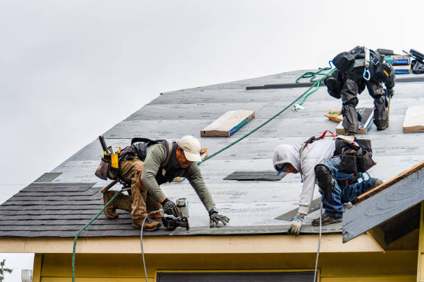 Professional Gutter Installation technician working in Valencia, CA